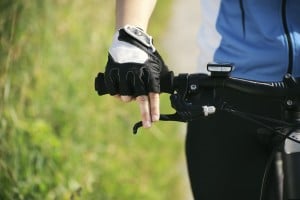 young woman training on mountain bike and cycling in park